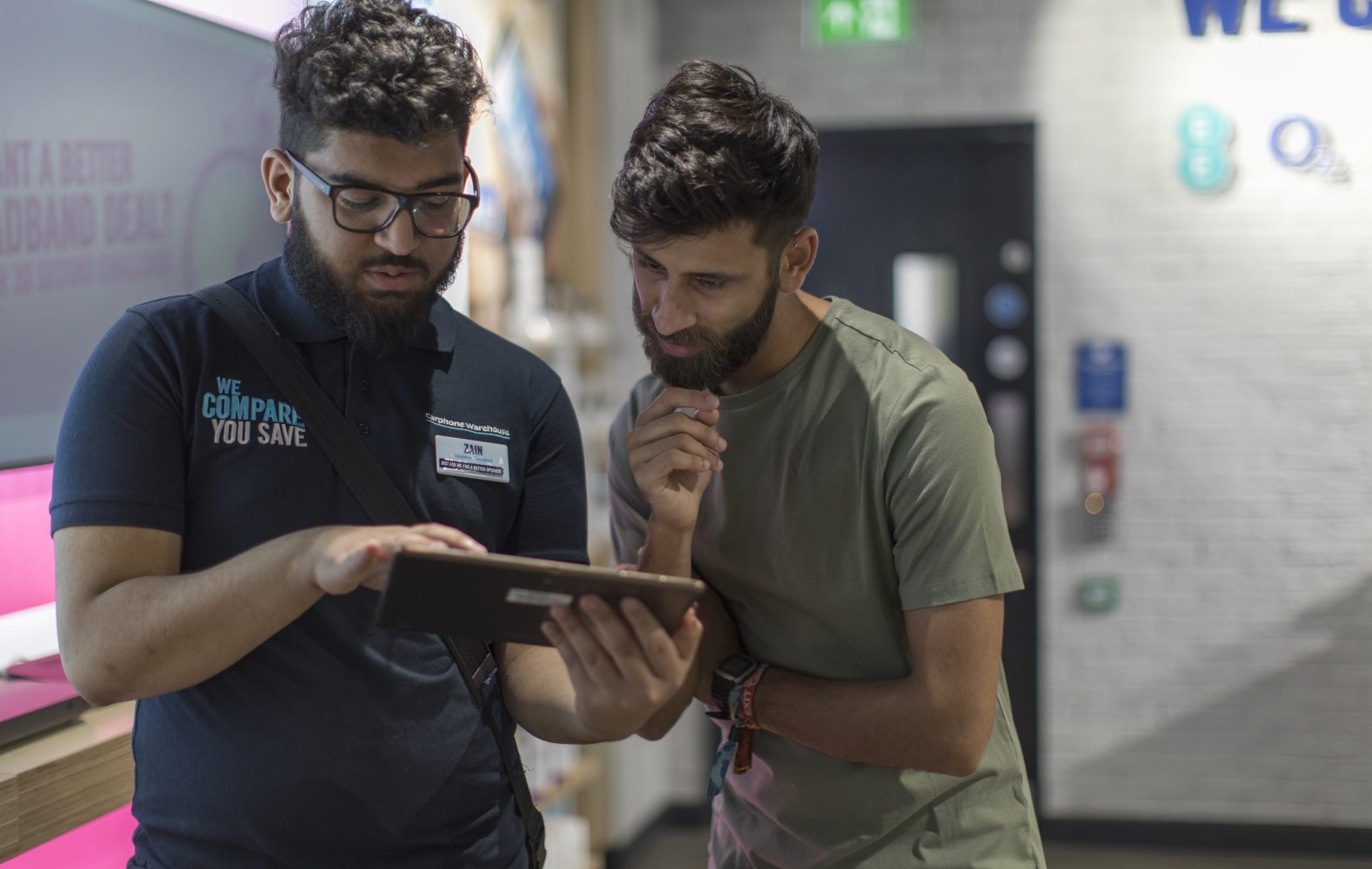 Staff and employee talking at Carphone Warehouse Canary Wharf, retail store and service design, by Household.