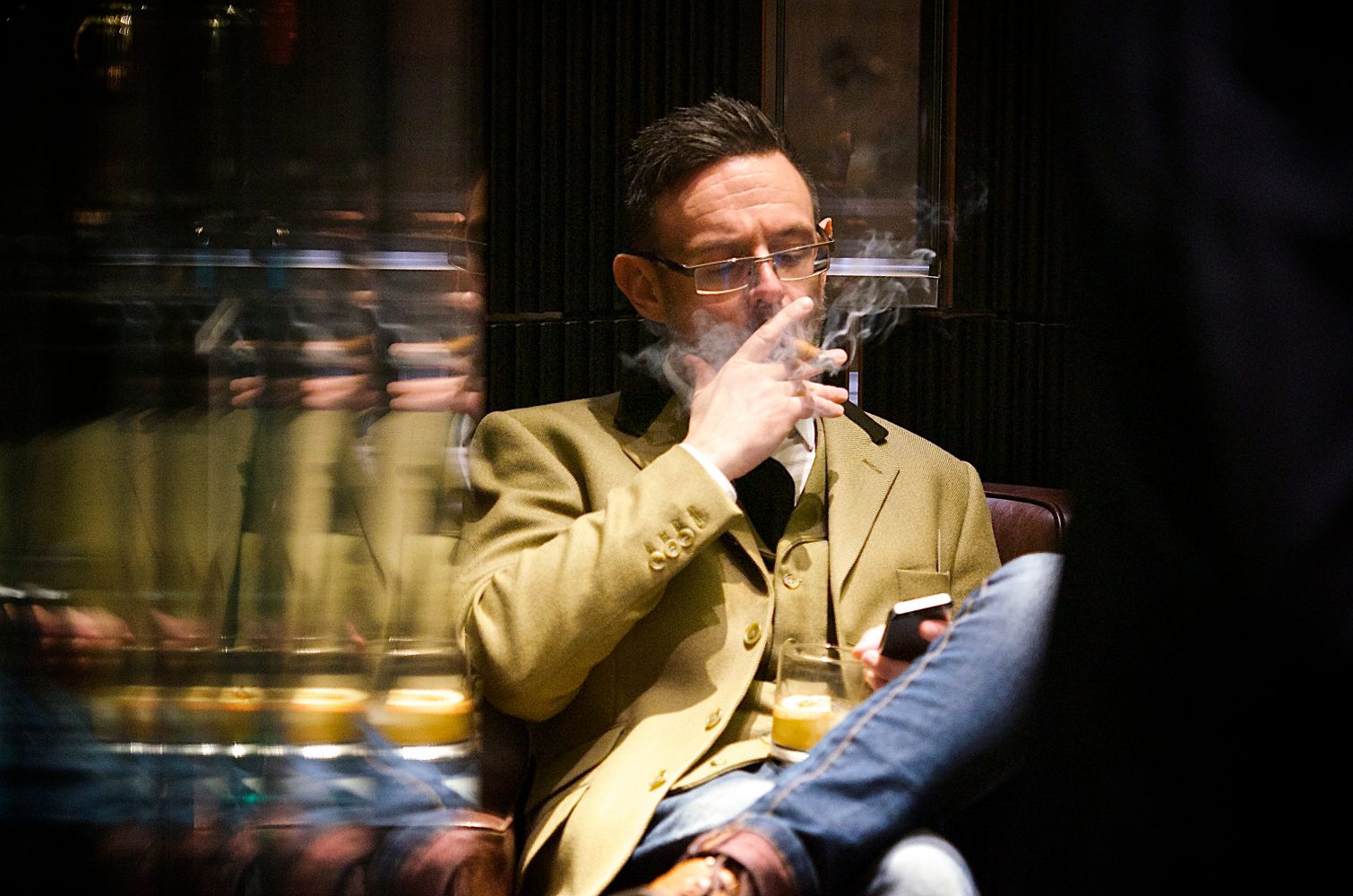 Customer smoking cigar, Dunhill 1A St James's, Retail and Hospitality Experience Design by Household.