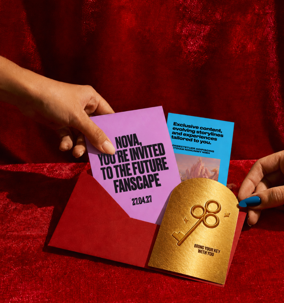 Example invites to Entertainment and IP experiences. Two hands reach to pull the invitations out of a red envelope. The invitations read: 